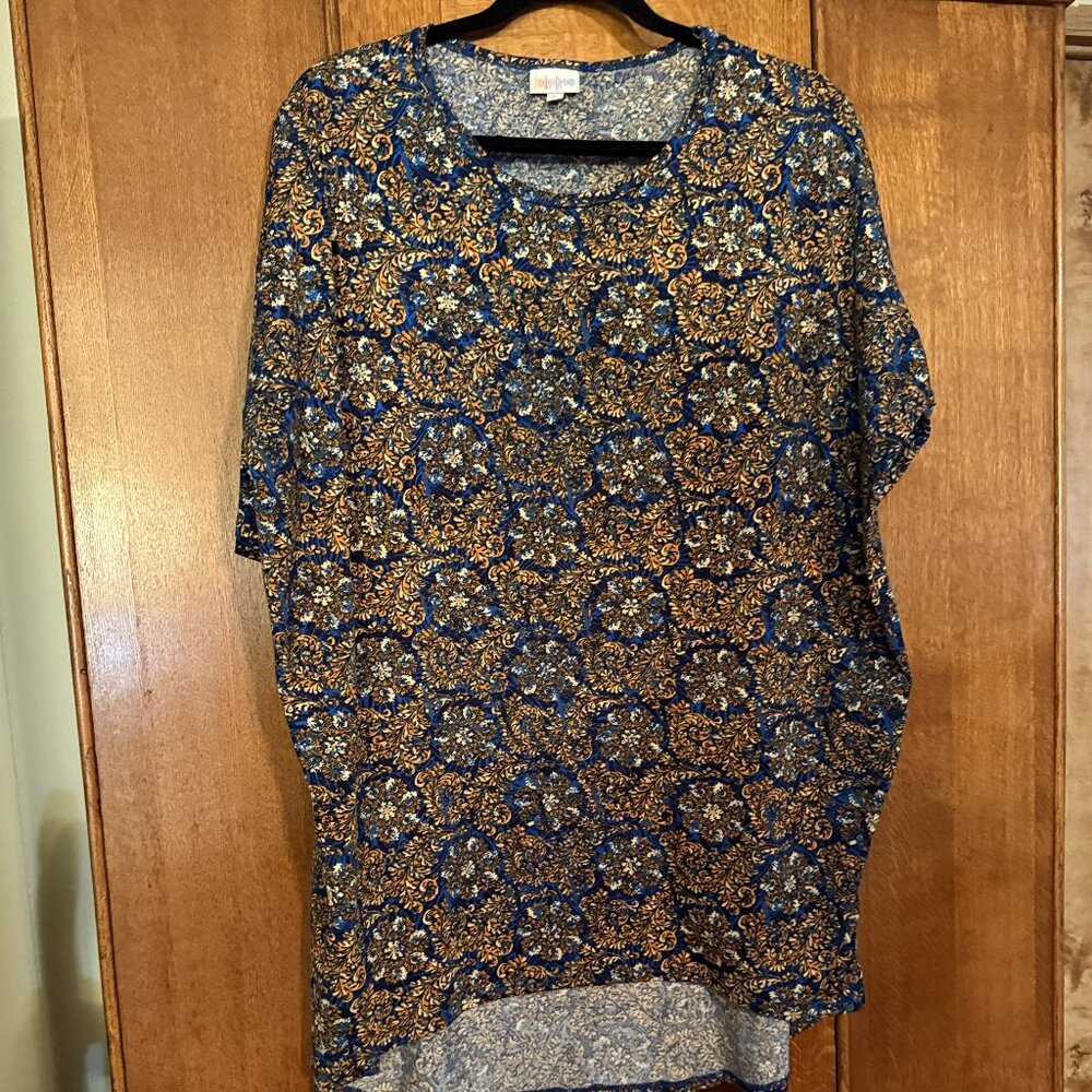 LuLaRoe Irma, Size Large, Blue background with Tan/orange leaf & flower design